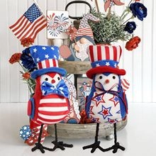 Detail of Independence Day plush bird figurines with red, white, and blue star patterns