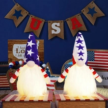 Close-up of glowing patriotic gnomes with LED beards for American Independence Day decor