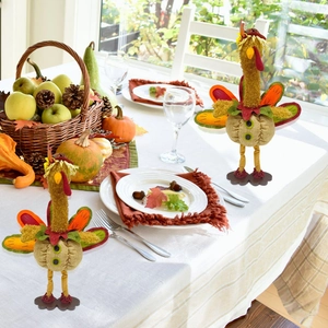Standing turkey figurine with harvest pumpkin design for Thanksgiving table decoration