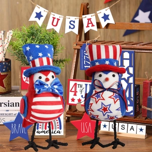 Detail view of Independence Day fabric bird figurines with star and stripe patterns