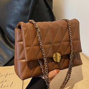 Brown quilted chain shoulder bag with gold twist lock and vintage leather texture