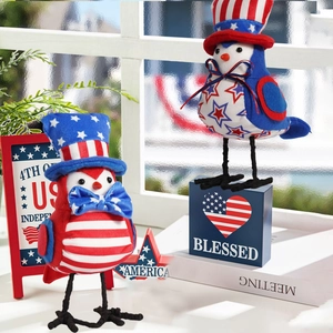 Detail of Independence Day bird figurines with American flag stars and stripes patterns