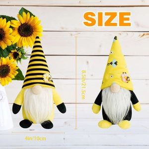 Pair of bumble bee themed gnomes with daisies and stripes for holiday decoration
