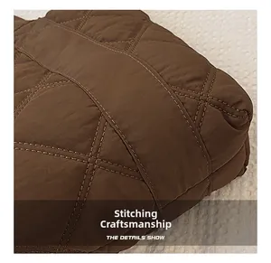 Macro shot of precise diamond quilted stitching craftsmanship on nylon tote bag