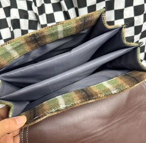 Detailed view of the large capacity backpack featuring three internal compartments