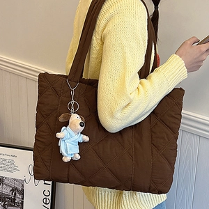 Quilted nylon tote bag in coffee brown with dog plush charm and large capacity