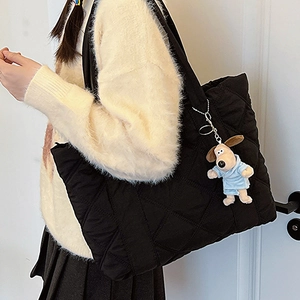 Large black quilted nylon tote bag with rhombus pattern and cute dog plush pendant