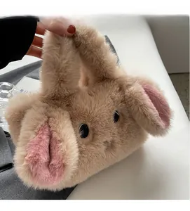 Detail of soft plush rabbit handbag in light brown with cute ears and fluffy texture