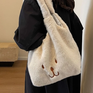Borsa tote in ecopelliccia bianco panna con ricamo animale per la moda invernale