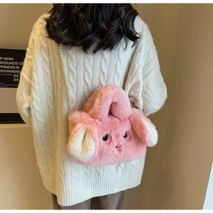 Pink plush bunny bag with soft faux fur texture and elegant pearl chain strap detail