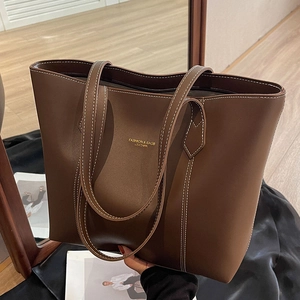 Brown large capacity leather tote bag with contrast stitching for daily commute