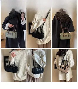 Dettaglio della mini borsa Boston in vari colori con finitura opaca testurizzata