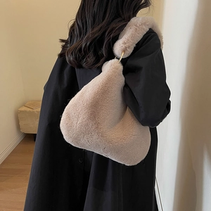 Fuzzy faux fur large shoulder bag in beige with gold metal ring detail for winter