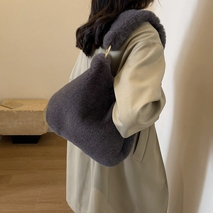Fuzzy dark gray faux fur tote bag for women with gold metal rings and soft texture
