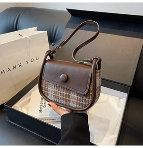 Vintage checkered leather small square bag presented in a luxury black gift box