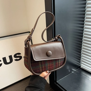 Chic vintage plaid crossbody saddle bag in red and green tweed with leather details