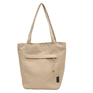 Bolso tote de lona beige minimalista con bolsillo frontal y detalles trenzados