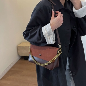 Retro oversized crossbody bag with red suede flap and gold chain detail for women