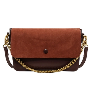 Vintage rust red suede and dark brown leather crossbody bag with gold chain strap