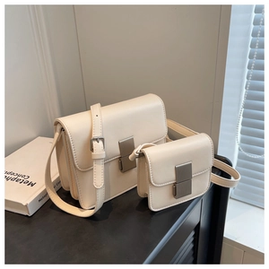 Set of minimalist beige PU leather shoulder bags with elegant silver striped metal buckles