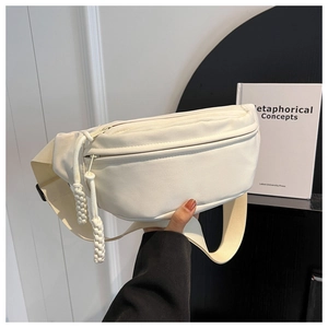 Detail of white minimalist canvas waist bag with braided zip pull and wide strap