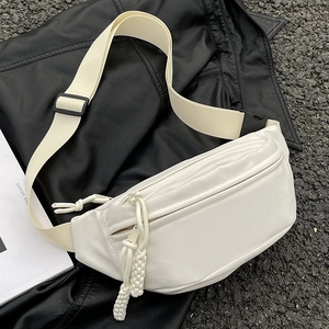 White minimalist canvas waist bag with adjustable strap and multiple zipper pockets