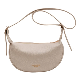 Creamy crescent moon shoulder bag in premium lychee grain leather with gold hardware