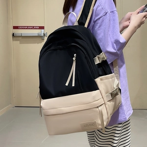 Sac à dos bicolore noir et beige en toile pour étudiants avec écusson cuir LIBANO