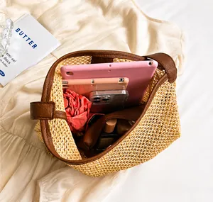 Top view of woven straw bucket bag showing internal capacity for tablet and daily items