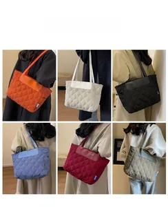 Collage of quilted tote bags in six colors including orange, cream, and blue