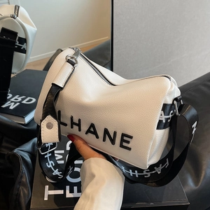 White pebbled leather Boston bag with wide black strap and LHANE logo details