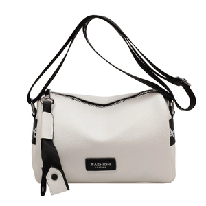 White lychee grain leather crossbody pillow bag with fashion tag and wide shoulder strap