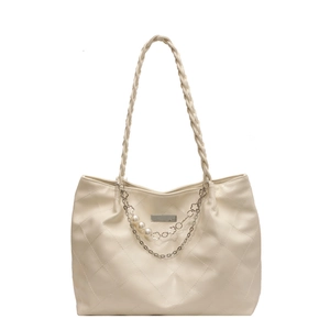 Quilted tote bag with woven straps and pearl chain detail in off-white finish