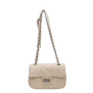 Elegant cream quilted crossbody bag with silver chain strap and wave texture design