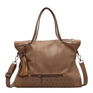 Brown large capacity tote bag with rivets, tassel charm and adjustable strap