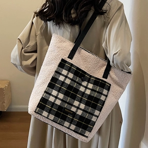 Winter faux fur tote bag in beige with black plaid pocket and leather shoulder straps