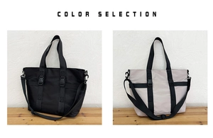 Detail showing color selection of large tote bags in black and light grey with buckled straps