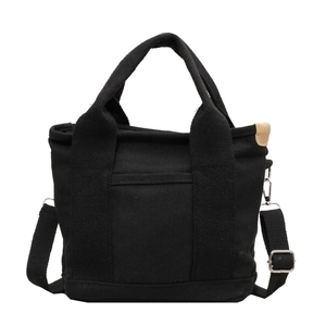Large capacity black canvas tote bag with adjustable shoulder strap for casual daily use