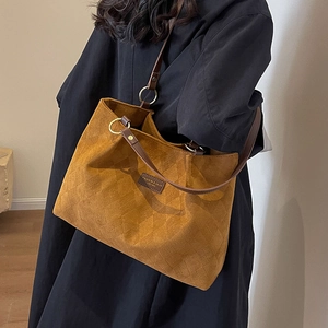 Retro brown large capacity tote bag with geometric embossed suede and leather straps