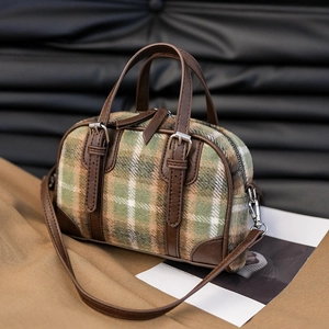 Classic green plaid Boston bag with leather trim and shoulder strap for autumn/winter