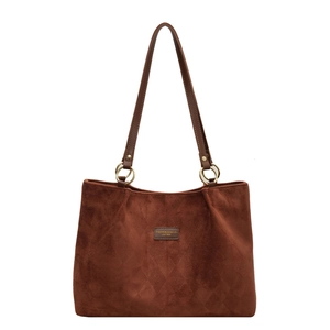 Brown matte leather tote bag with quilted diamond pattern and golden metal ring accents