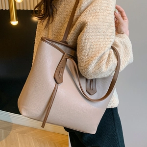 Minimalist large capacity tote bag in taupe leather for women's daily commute and style