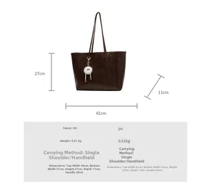 Brown PU leather tote bag details with dimensions 42x27x11cm and white pom-pom charm