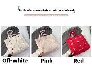 Detailed close-up showing beige, pink, and red corduroy tote bags with Our Future print