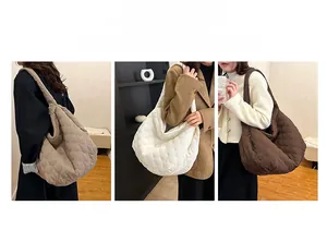 Close-up of heart-shaped quilted canvas tote bag showing soft texture and spacious design