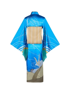 Detail view of the back of a blue Japanese kimono with wave patterns and an obi belt