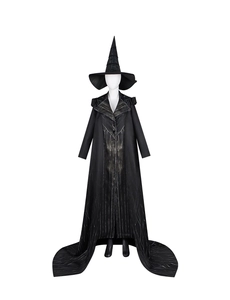 Detail of black wicked witch costume with textured stripes and tall pointed hat
