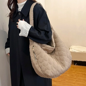 Large beige corduroy tote bag with wave quilting and side zipper for daily commute