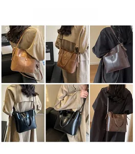Detailed views of vintage bucket bags in brown, coffee, and black worn by a model