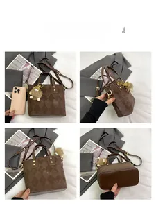 Detail view of brown leather bucket bag with diamond lattice pattern and plush charm